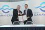 Port Canaveral CEO John E. Walsh, left, and Gulftainer’s Badr H. Jafar