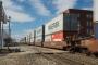 Concerning US goods transport, it is vital that intermodal continue to perform up to its maximum capabilities now that it is entering the normal seasonal upswing in volume and full enforcement of the electronic logging device mandate. Photo credit: Shutterstock.com. Containers transported by a US railroad.