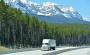 A truck travels in Canada.