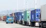 trucks line up at gates at Oakland port