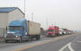Trucks line up outside the Port of New York and New Jersey.