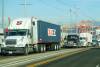 Port conditions remain difficult for truckers, but rates offer steadier income than in truckload. Photo credit: Shutterstock.com.