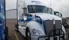For-hire trucking companies have made large gains in payroll this year, a sign of continuing strong demand in the contract trucking market. Photo credit: Shutterstock.com.