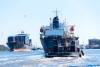 Scores of ships remain anchored off US East Coast ports waiting to berth, held up by rising import volume and worsening shore-side bottlenecks. Photo credit: Shutterstock.com